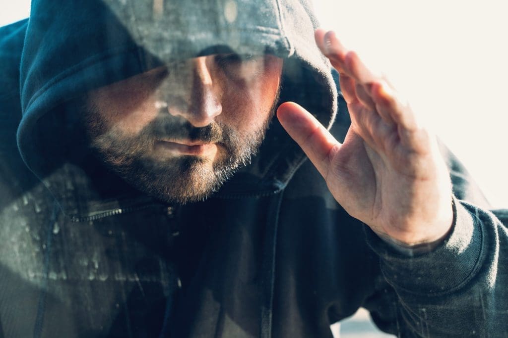 theft of services A man prepares to steal from a car